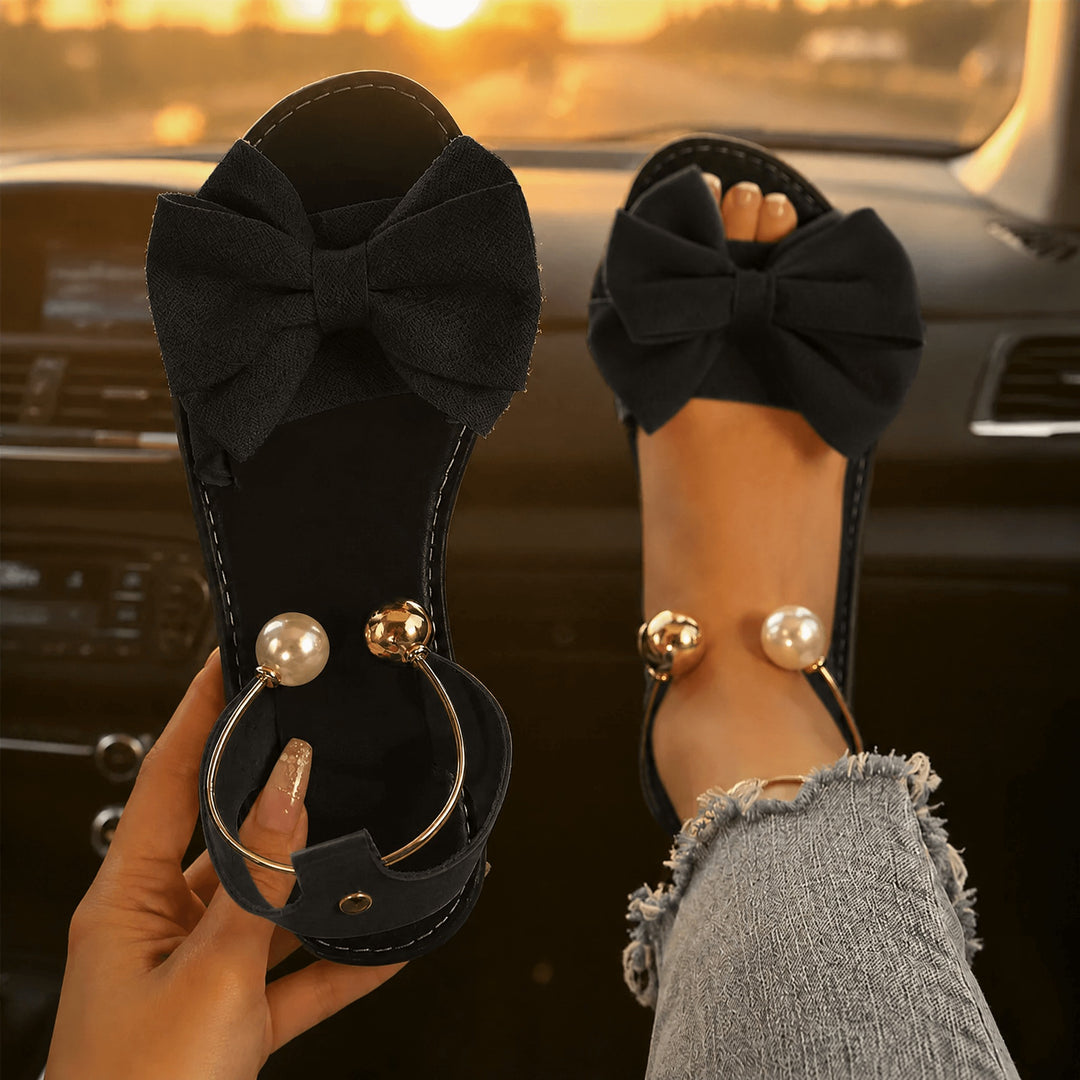 Vennla | Bow Flat Sandals with Pearl Ankle Cuff in product view 13